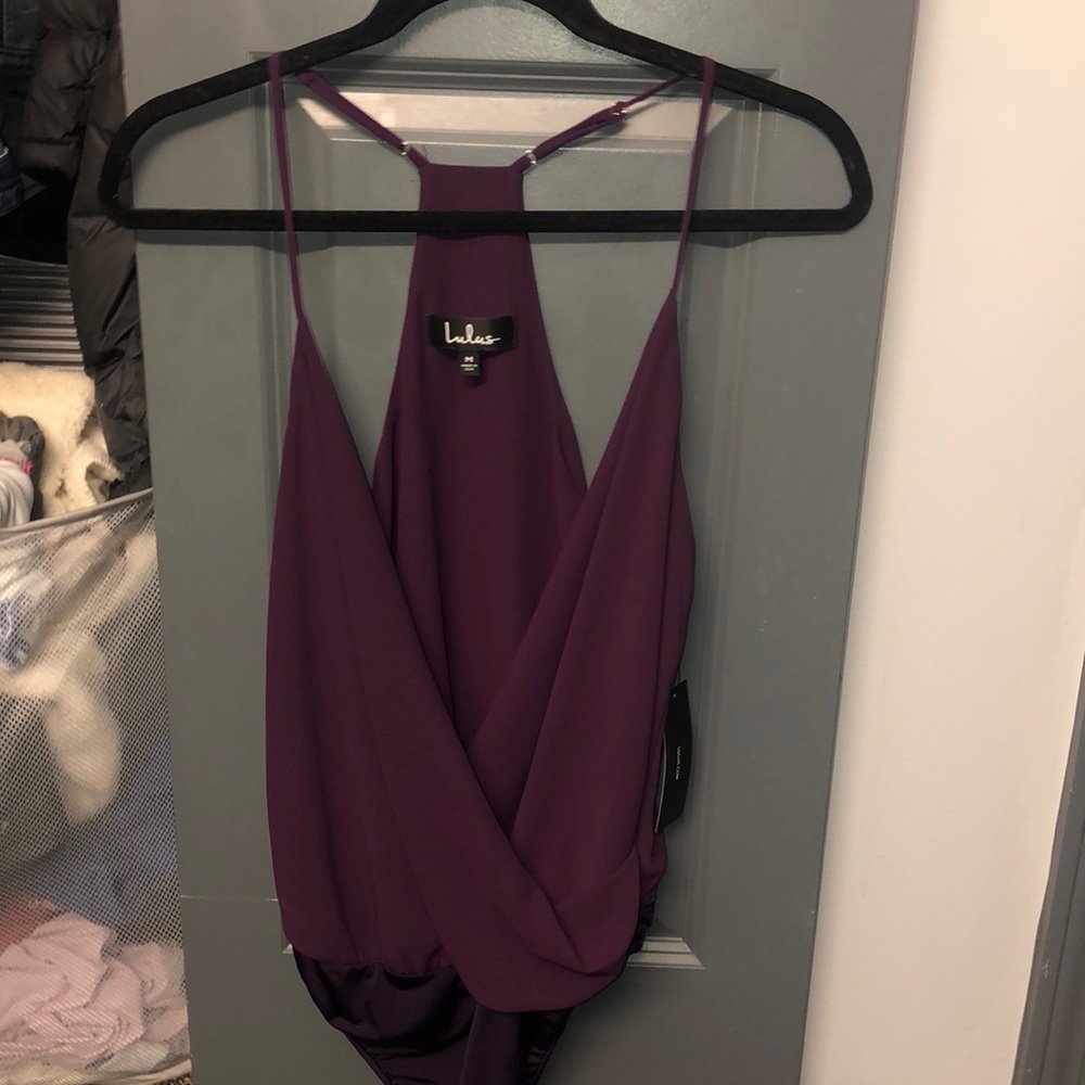 Purple cross over body suit